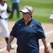 Saline head coach Alicia Seegert walks to talk to an umpire during the game against Mattawan on Tuesday, June 11. Daniel Brenner I AnnArbor.com